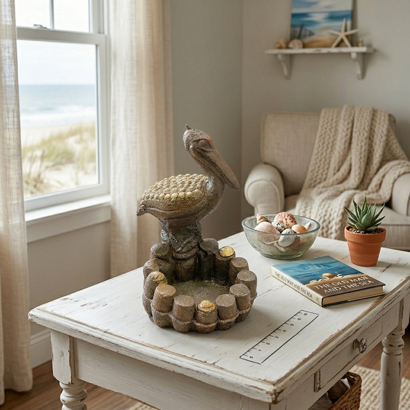 Decorative Cement Pelican with Seashell Accent