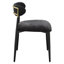 Chaise de salle à manger moderne et minimaliste, revêtue de tissu noir, avec dossier cylindrique incurvé et pieds en métal.