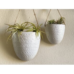 https://assets.wfcdn.com/im/13625304/resize-h310-w310%5Ecompr-r85/1138/113823049/phobos-handmade-ceramic-pot-planter.jpg