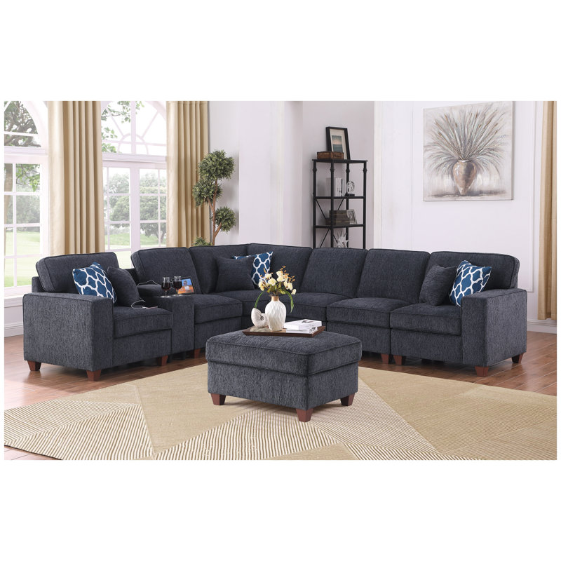 Canapé modulaire Gina en chenille noire avec repose-pieds, console porte-gobelet et port de chargement USB