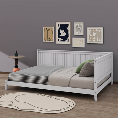 Sleek Minimalist Wooden Daybed Doubling As A Sofa Bed by George Oliver