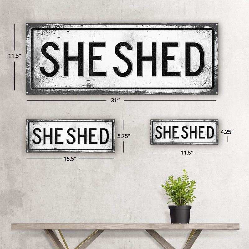 «Light, She Shed Metal Sign» sur métal, H 4,25 po x l 11,5 po x P 0,04 po