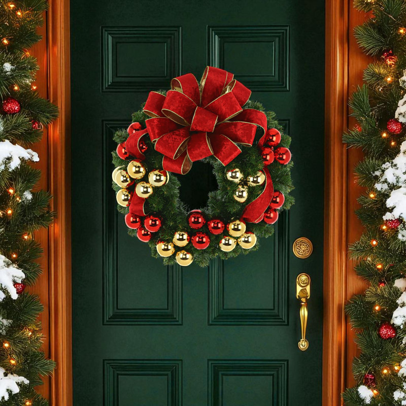 Holiday Evergreen Wreath with Gold and Red Ornaments and Red and Gold Bow