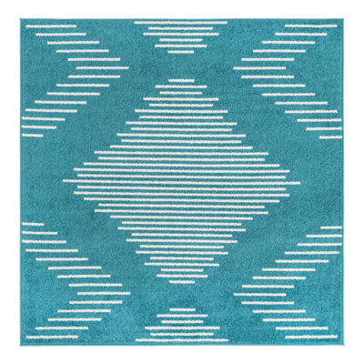 Tapis bleu à motif géométrique