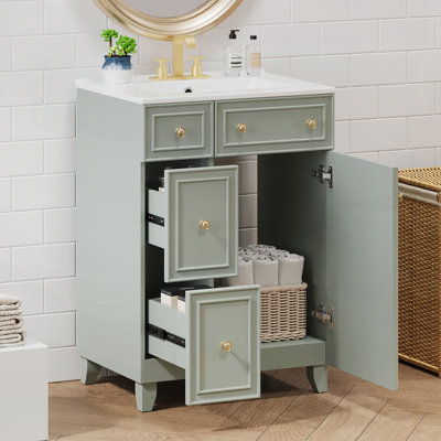 Meuble-lavabo 24 po avec lavabo en céramique, 2 tiroirs et 1 porte à fermeture en douceur pour les petites salles de bain