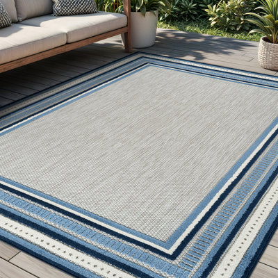 Coastal Border Ivory/Navy Indoor/Outdoor High-Low Area Rug