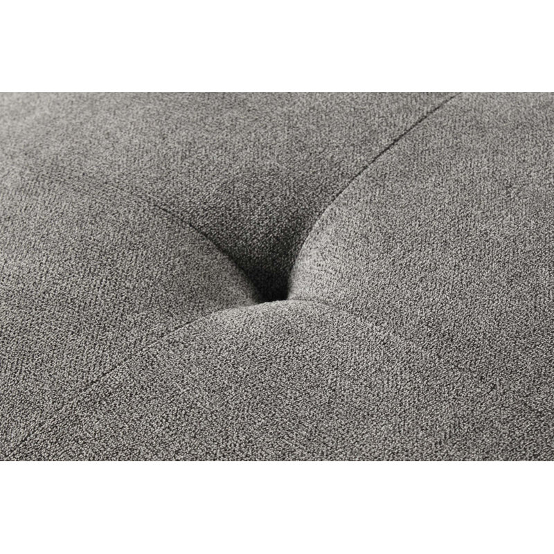 Chaise en chenille avec coussin décoratif, offrant un confort et un style inégalés pour des moments de détente dans n'importe quelle pièce.