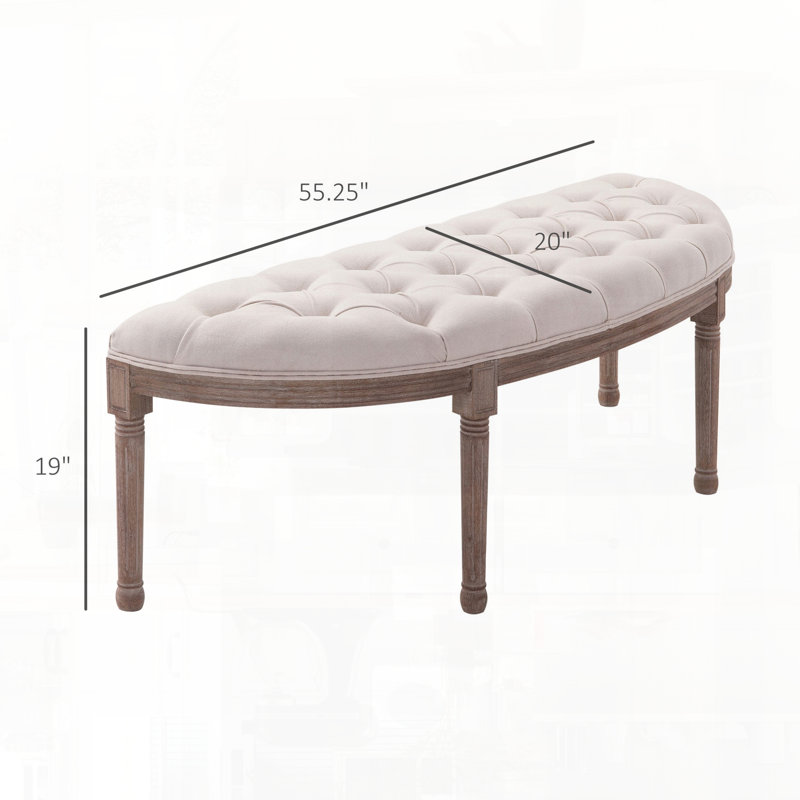 Banc de bout de lit tapissier à l'extrémité du lit