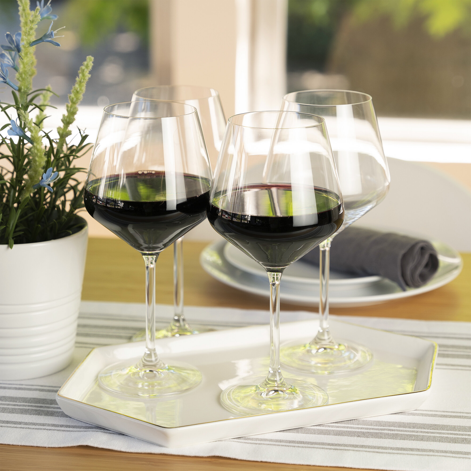 https://assets.wfcdn.com/im/13692059/compr-r85/1328/132815056/spiegelau-4-piece-226oz-lead-free-crystal-red-wine-glass-stemware-set.jpg