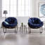 Chaise berçante en osier avec structure en métal-376665668