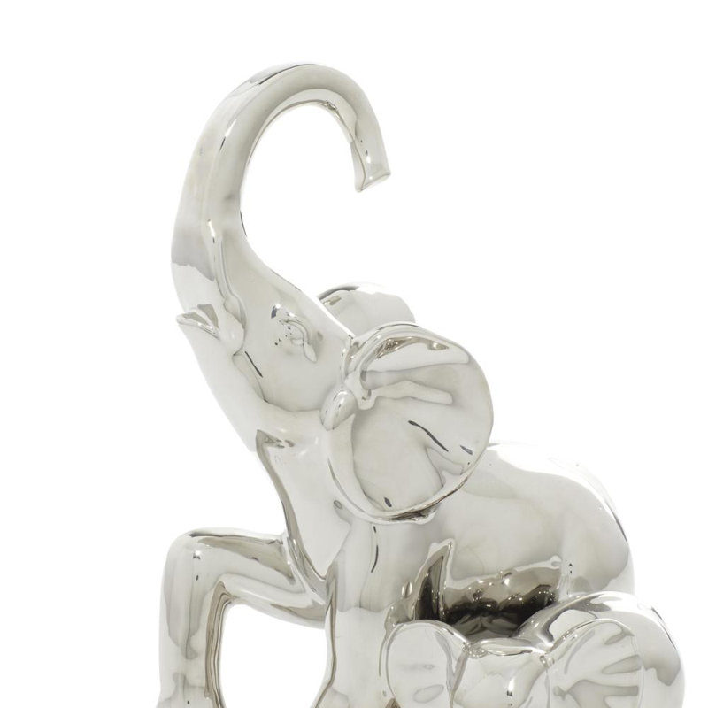 Ensemble de 2 figurines argentées