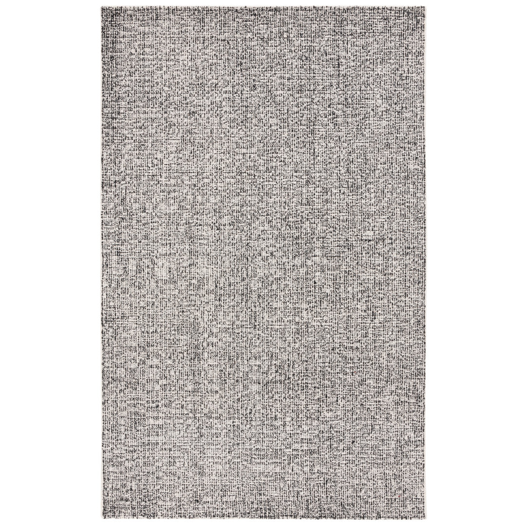 Macguiness Ebony Hand Tufted Wool Jute Cotton Rug in Black/Ivory Hokku Designs Rug 