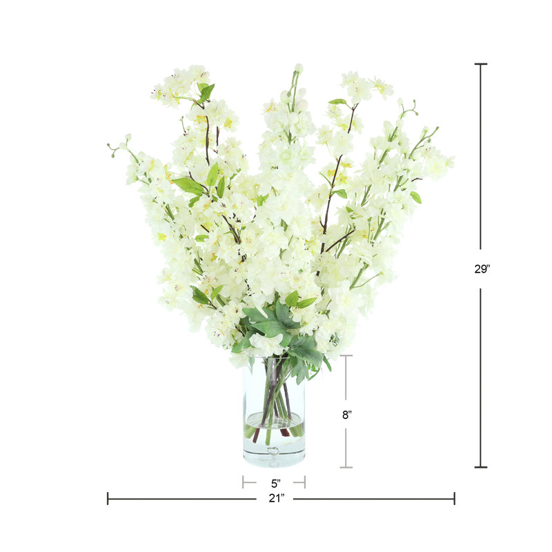 Delphinium And Cherry Blossom In Glass Vase