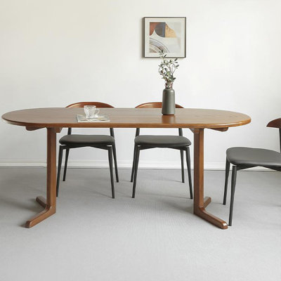 Table de salle à manger ovale en bois massif de couleur noyer