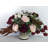 Arrangement mélangé prune rose dans un vase