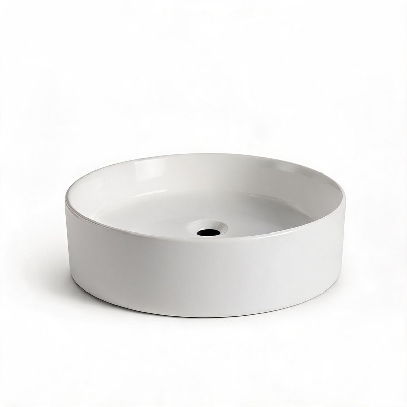 Lavabo de salle de bain rond en céramique blanche brillante de 40 cm (16 pouces) à poser, avec surface lisse émaillée.