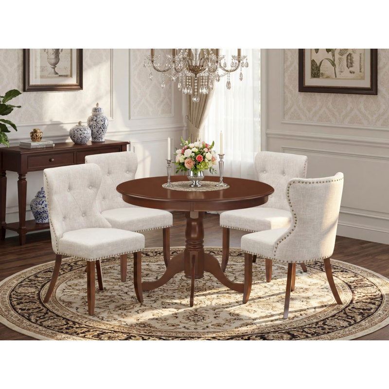 L'ensemble de mobilier de salle à manger 5 pièces comprend une table de salle à manger ronde avec piédestal et 4 chaises Parson revêtues de tissu de lin, acajou