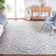 Ferrera Ikat Handmade Tufted Wool Blue / Ivory Area Rug