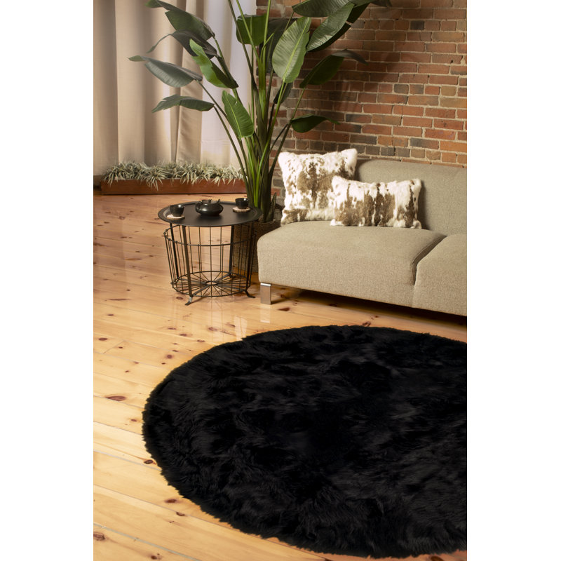 Tapis rond en fausse fourrure noire Clarsie