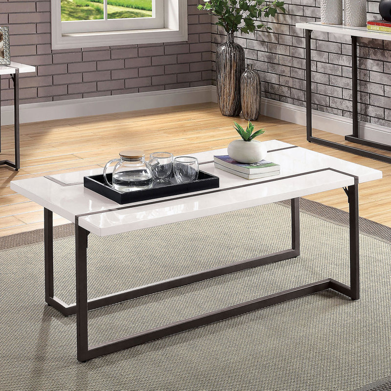Table basse moderne de style contemporain avec pieds extensibles, plateau en laque ultrabrillante et structure en acier au fini blanc et bronze