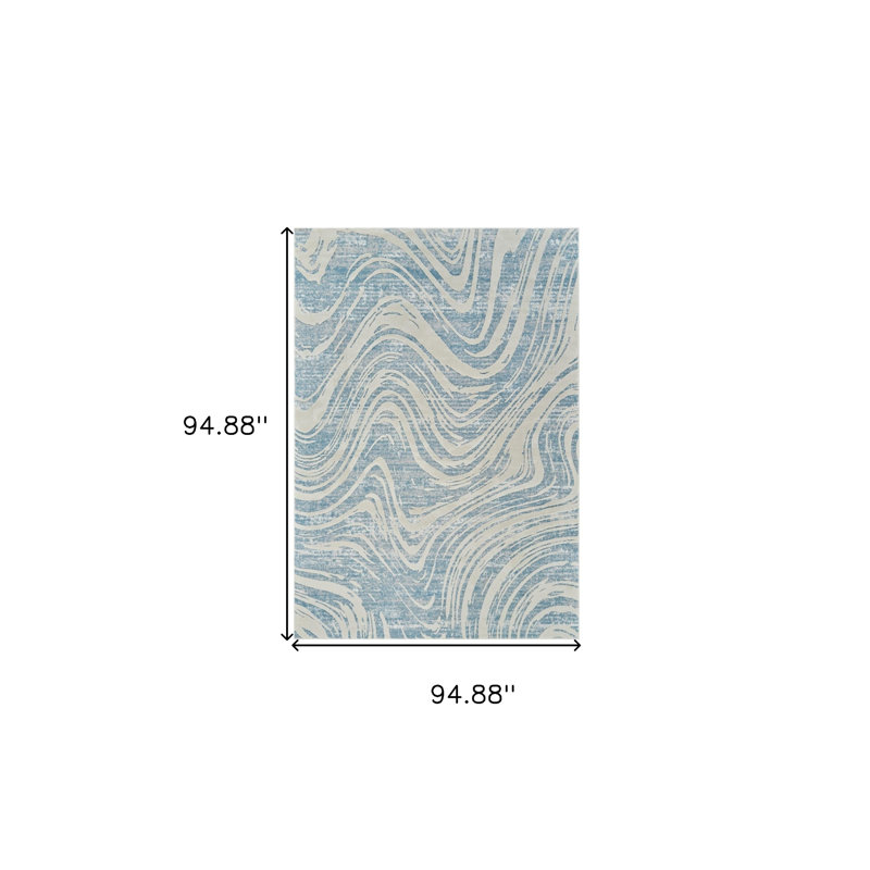 Tapis abstrait bleu et beige 8 pi x 11 pi