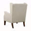 Fauteuil à oreilles capitonné