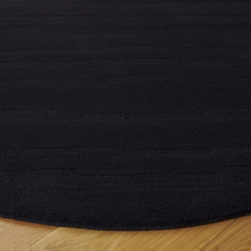 Fairborn Solid Color Hand Tufted Cotton/Wool Area Rug in Black, Round 6'