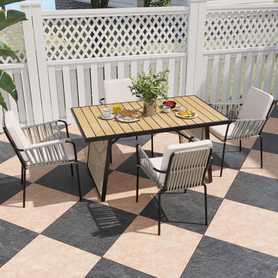4 - Person Rectangular Outdoor Dining Set with Cushions by Latitude Run 4 - Person Rectangular Outdoor Dining Set with Cushions by Latitude Run