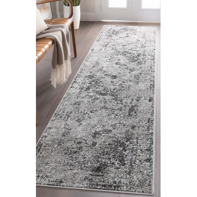 Tapis gris médaillon Well