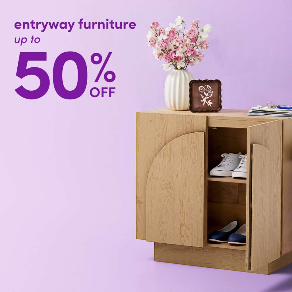 Entryway furniture up to 50% off featuring a light wood storage cabinet with flowers and shoes.