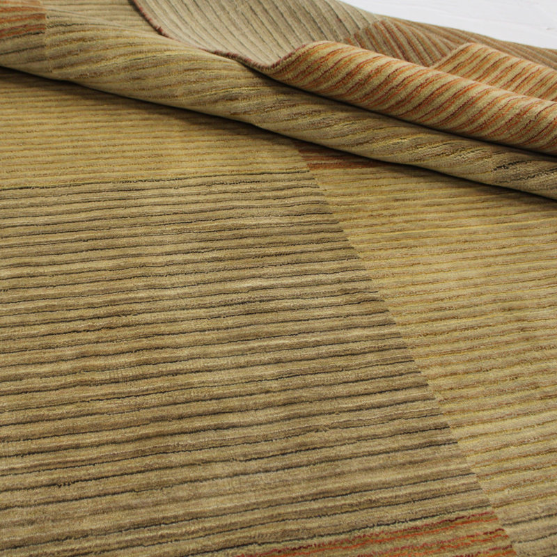 Wasif Area Rug in Brown