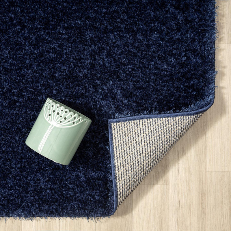 Tapis uni bleu marine tissé à la machine 5 pi x 7 pi