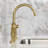 Kingston Brass Hallerbos Two-Handle 4-Hole Deck Mount Bridge Kitchen Faucet with Brass Side Sprayer-101073394