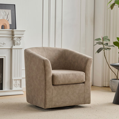 Fauteuil demi-tonneau pivotant en similicuir