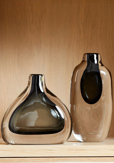 Glass vases with green accents