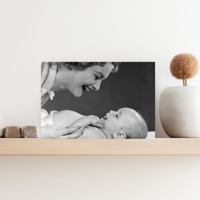 1950S Close-Up Profile Of Smiling Mother Leaning Toward Laughing Baby Lying On Bed Classic Retro Vintage Portrait Wall Art