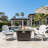 Beth 25" H x 42'' W Outdoor Propane Fire Pit Table with Glass wind guard, lid and Hideaway Gas Tank Seat, 50,000 BTU with Marble Tabletop, Wicker Base