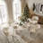 63" Oval Dining Table with White Sintered Stone Top & Roman Column Wood Base-649096551