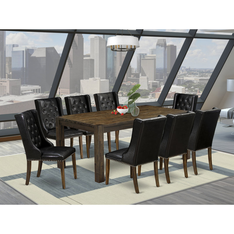 L'ensemble de table de cuisine 9 pièces comprend une table de salle à manger rectangulaire en bois rustique et 8 chaises Parson en similicuir noir