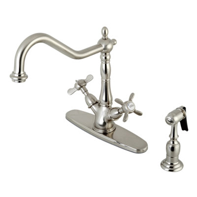 Kingston Brass Essex Two-Handle 2-or-4 Hole Deck Mount Kitchen Faucet with Brass Sprayer
