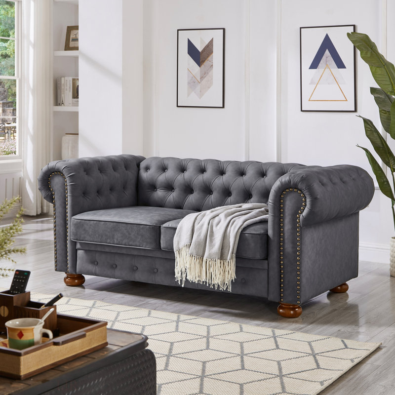 Causeuse de canapé classique en similicuir Chesterfield