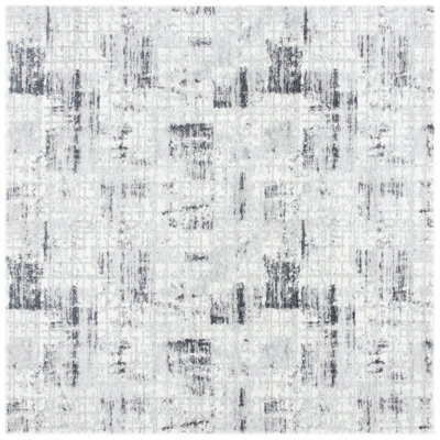 Tapis gris / noir à motif abstrait Zaid