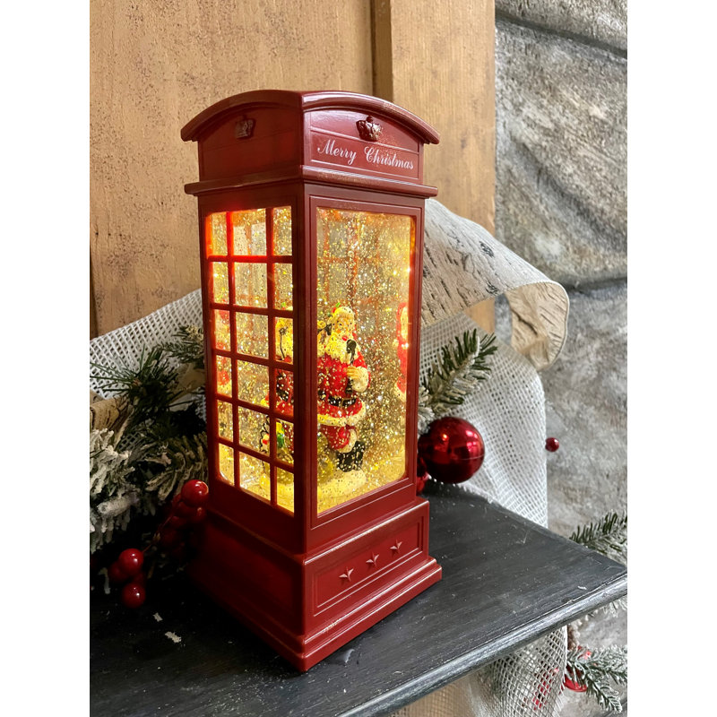 Père Noël dans une lanterne à piles