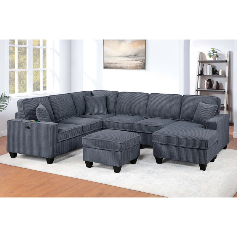 Canapé d'angle contemporain gris foncé 5 pièces, comprenant une méridienne, une chaise longue, un coin, un fauteuil sans accoudoirs et une table basse. Design moderne pour salon, salle de bain principale.