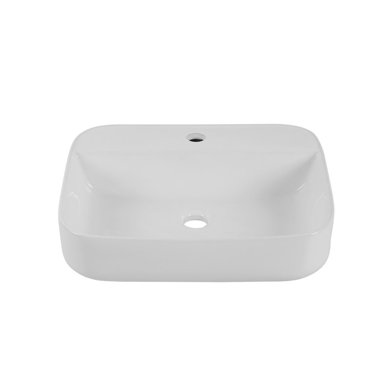 Lavabo de comptoir de salle de bain en céramique - blanc, avec une surface lisse et brillante blanchie convenant à diverses configurations