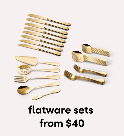 Gold flatware set with forks and spoons.