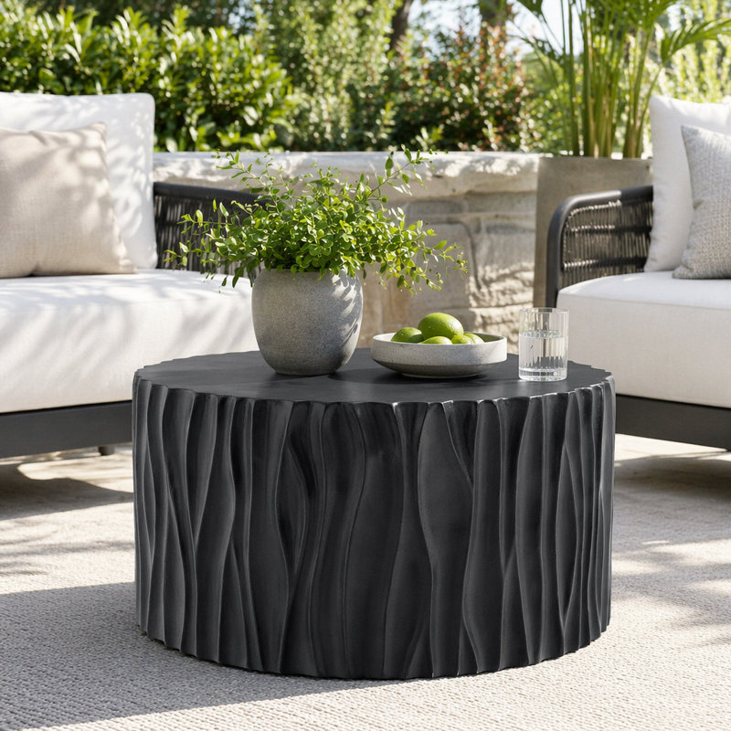 Table basse sculpturale ronde MGO avec texture ondulée