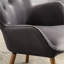 Fauteuil chic en velours gris avec dossier en bois et pieds magnifiques-537734893