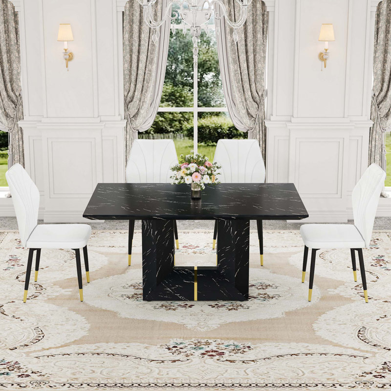 Ensemble de table et de chaises. Ensemble de salle à manger en MDF à motif de marbre avec chaises en polyuréthane avec un dossier élargi