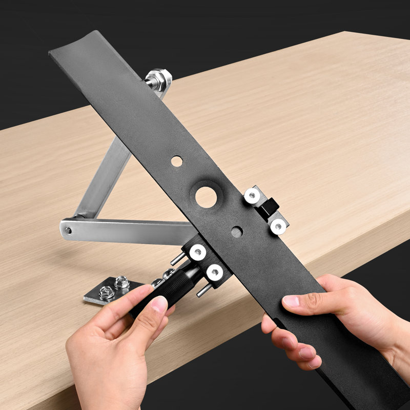 Aiguiseur et équilibreur de lame de tondeuse à gazon, outil d'affûtage de lame de tondeuse à gazon réglable de 15 ° à 45 ° avec 4 broches adaptatrices, roulements à billes et poignée agrandie de 25 mm, compatible avec la plupart des meuleuses d'angle